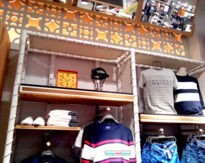 pull and bear shop interior shelves with old-school clocks