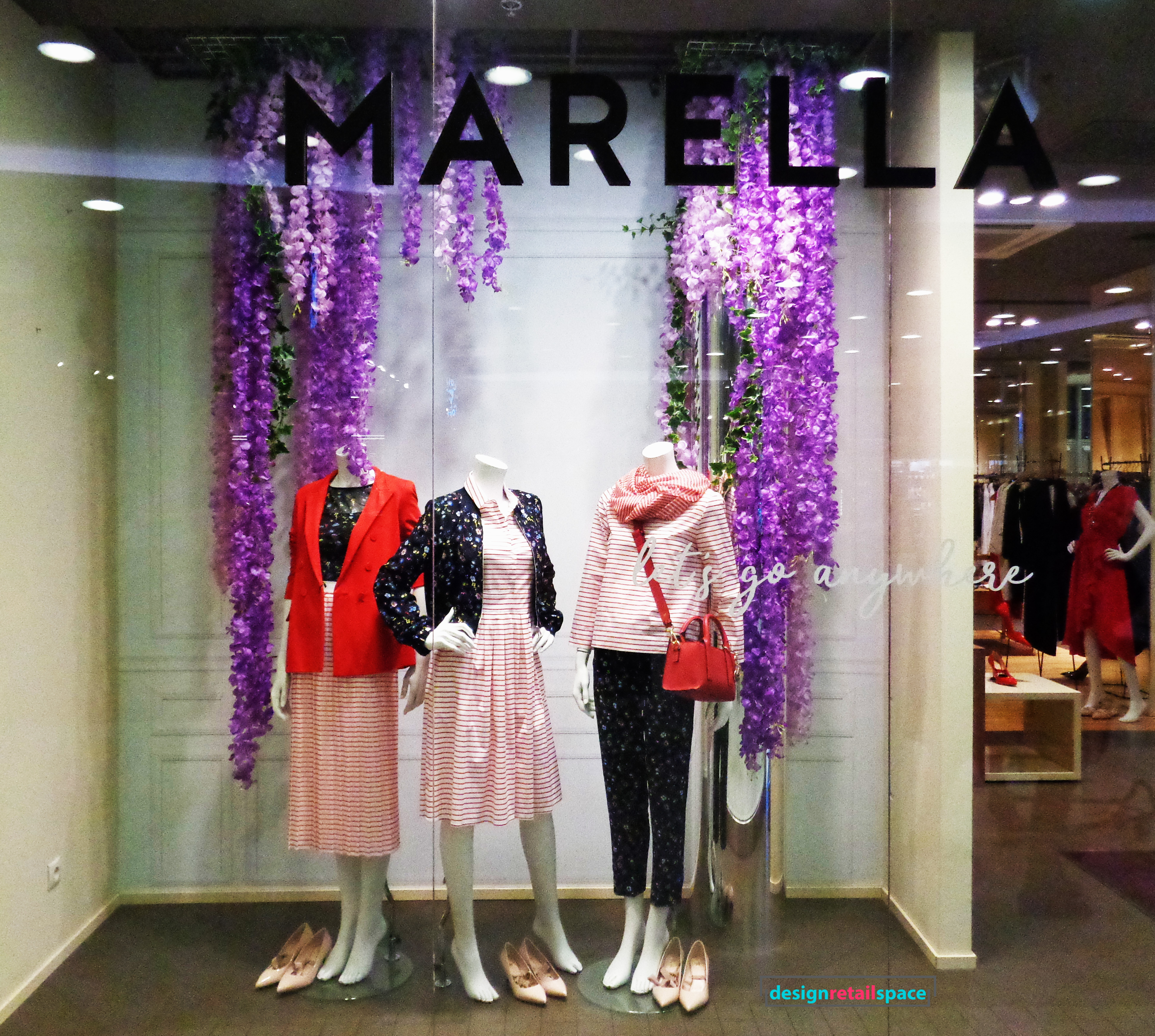 Marella, Warsaw, Poland. Floral trend represented by flower garland composition in popular violet shades.