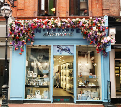 Newbridge Silverware , garlands of flowers decorating the facade